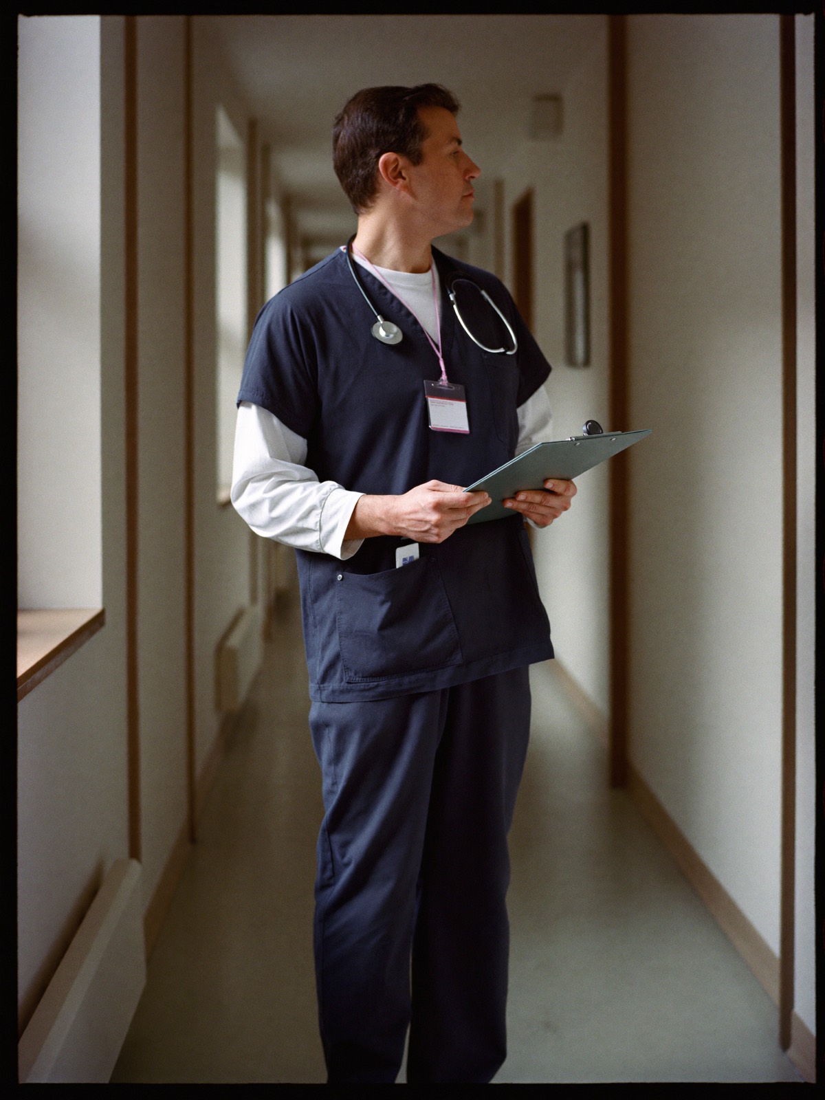 A healthcare worker at their place of work