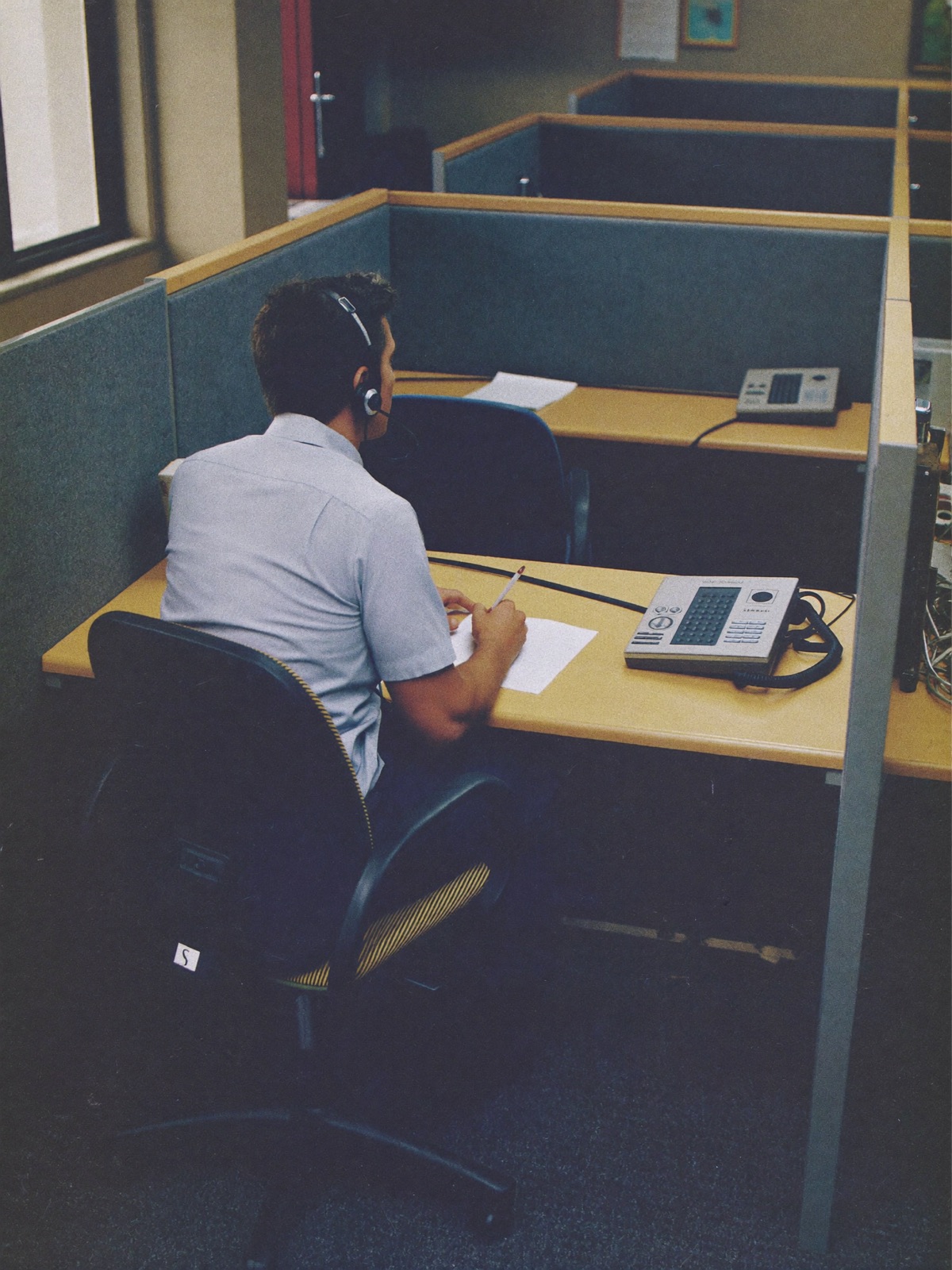 A customer service worker at their place of work